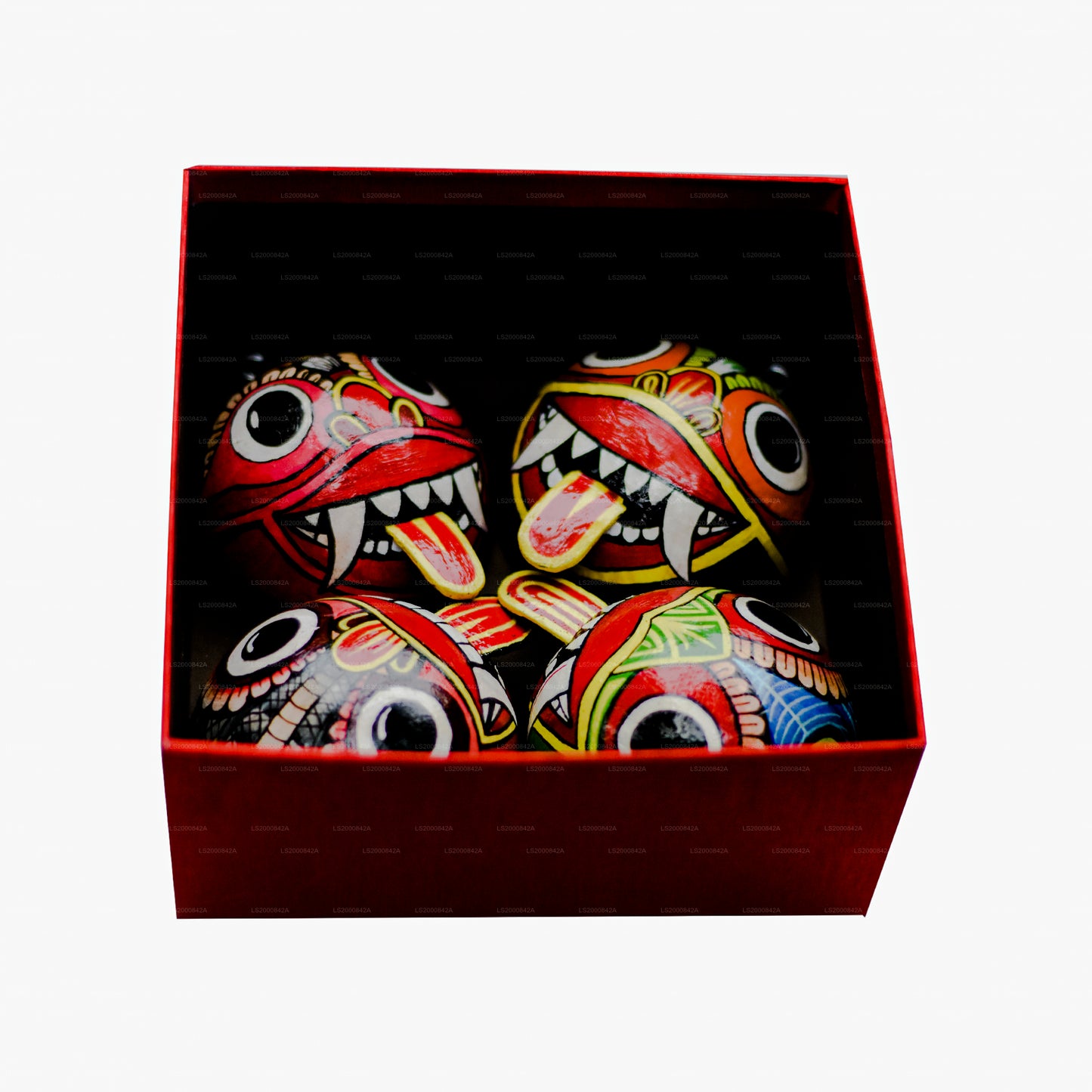 Masques raksha traditionnels du Sri Lanka (Mayura, Maru, Agni, Naga) peints sur des coquilles de noix de coco (lot de 4)